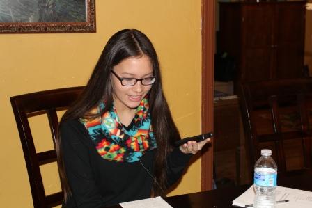 Freshman Bella Cornell records her radio show using her smartphone.