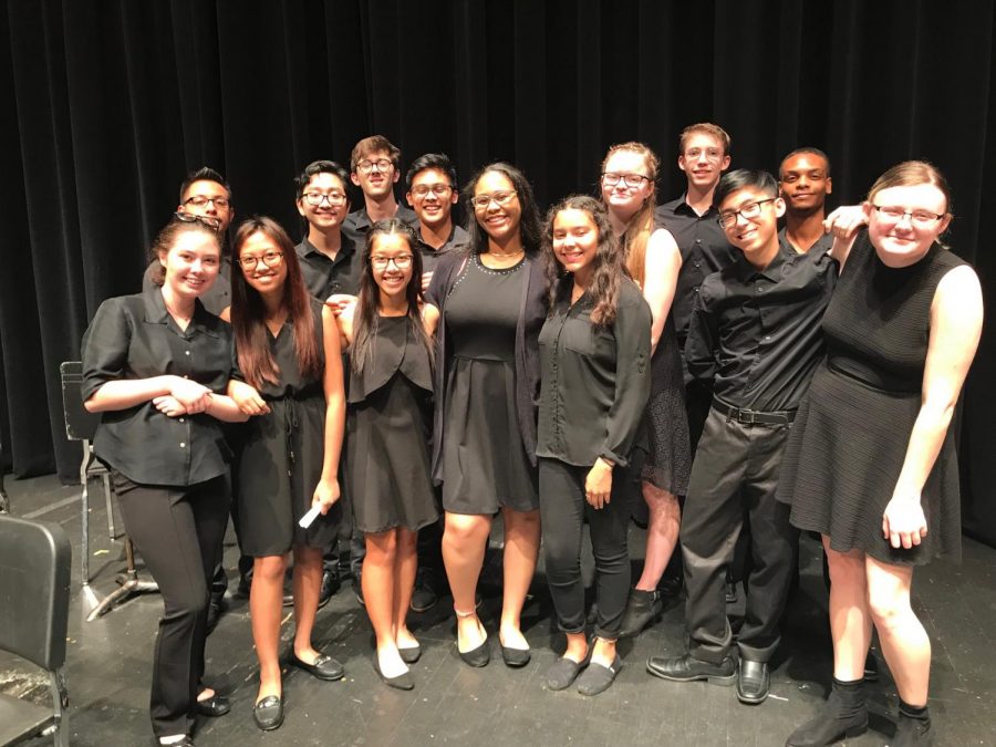 Orchestra students perform with honor group