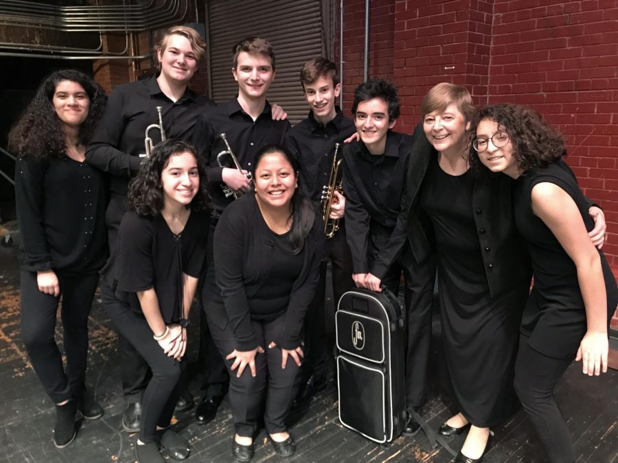 Members of the HCP band hang out with clinician Susan Clothier at the All City Clinic after their performance.