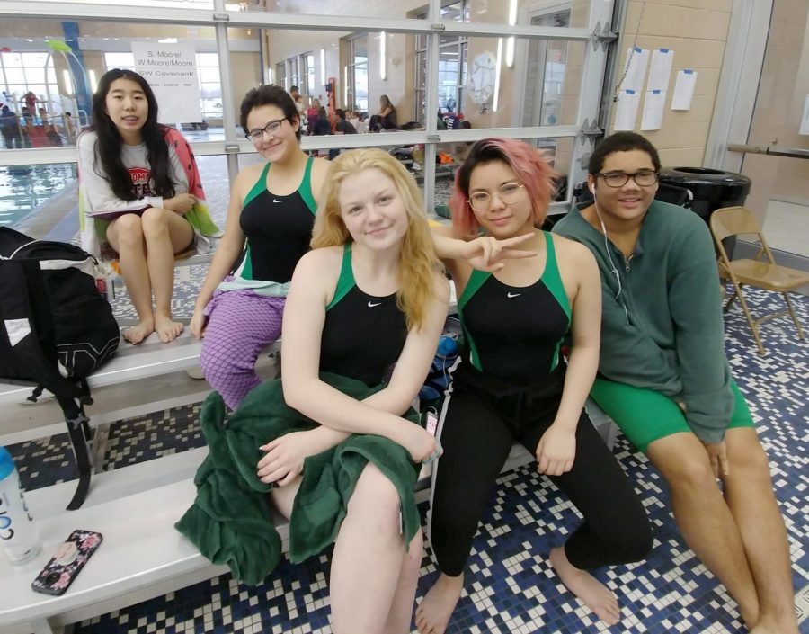 Swim team members Grace Ha, Isabella Vega, Faith Morrison, Reyna Sun and Alex Nadjkovic all take a breather while at the State swim meet.