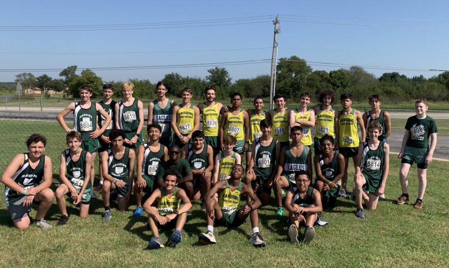 The cross country team poses together after running in Kiefer, OK.