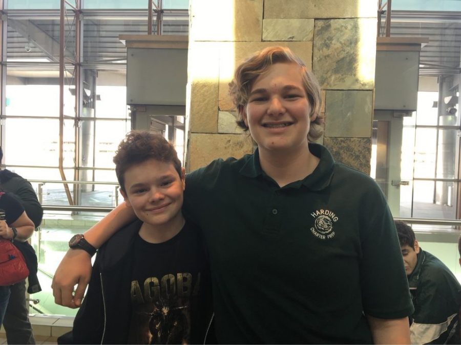 Gage Catteeuw, right, and his French exchange friend Sasha, left, share a moment in Will Rogers World Airport.