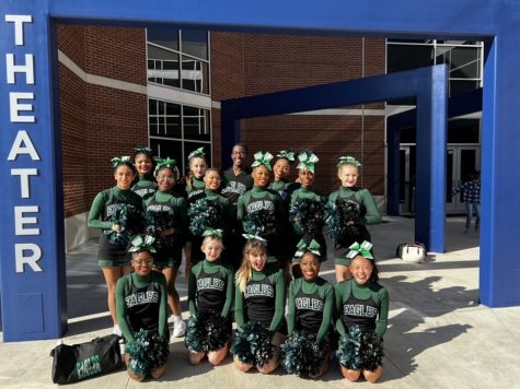 Members of the HCP Cheer Team pose together before competing at the Regional cheer competition in Enid, Okla.