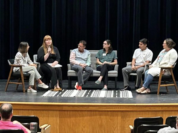 Teachers from both Harding Charter Preparatory High School and Independence Charter Middle School answer questions in a round table format at convocation for the districts teachers on Aug. 9. 
