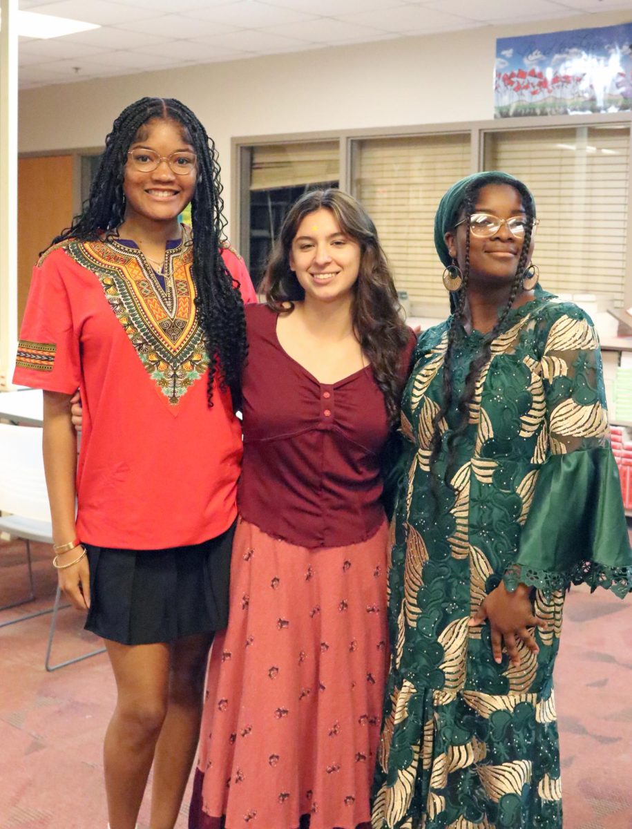 Seniors Chai Solomon, Candela Principi and Bryanna Mayberry show off their culture during the annual Latin Student Association's Spirit Week celebrating National Hispanic Heritage Month. Students were encouraged to wear clothing that represented their culture.