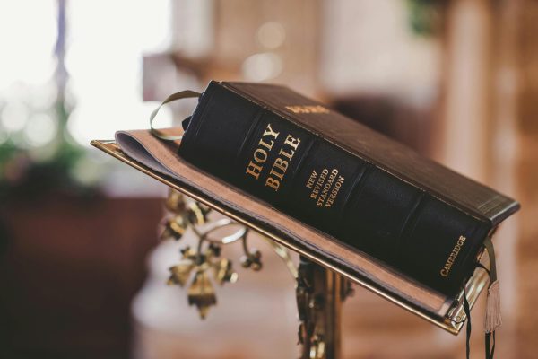 In his tenure as State Superintendent of Instruction, Ryan Walters pushed to remove "woke ideology" from schools and to place Bibles in every classroom. He resigned at the end of September, two years into his term. Photo by Pixabay, via Pexels.